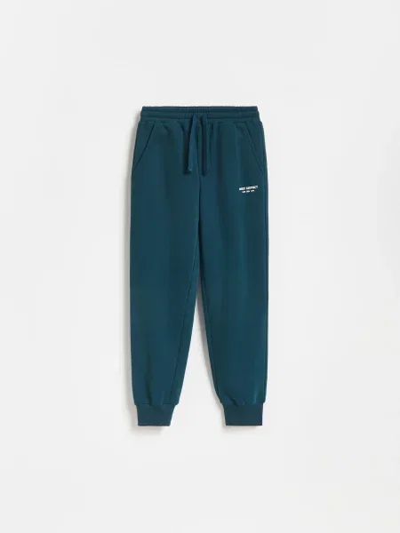 Reserved Pantaloni jogger cu conținut ridicat de turcoaz-închis
