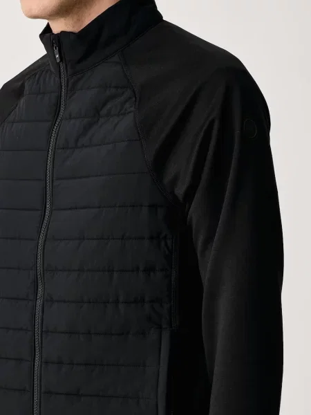 Férfi hibrid kabát SKECHERS The Hoodless Hybrid black. Méret: M fekete