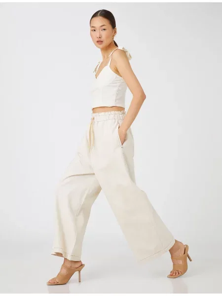 Szerokie spodnie Koton o krotszym kroju białe