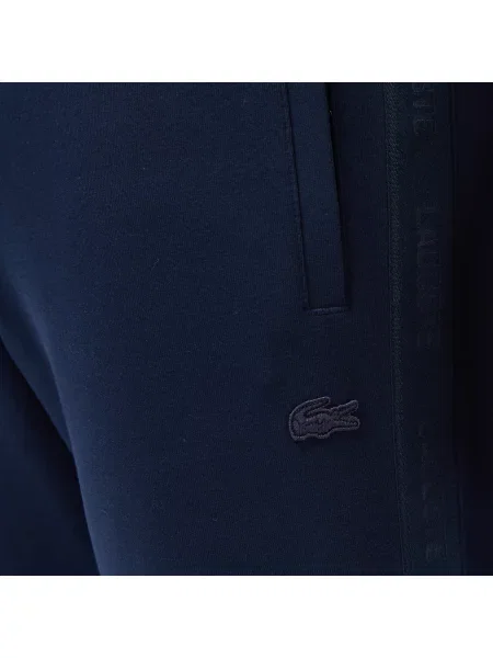 Lacoste Spodnie Dresowe Relaxed Fit granatowe