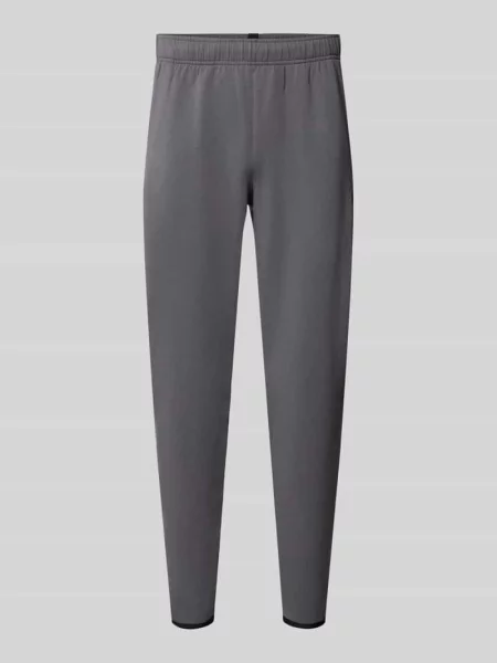 Spodnie dresowe o kroju regular fit z dodatkiem bawełny model Unstoppable' Under Armour