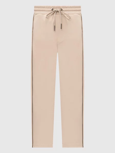 Спортивні штани з вишивкою логотипа Iceberg бежеві
