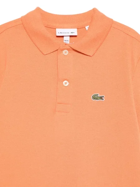 Koszulka polo dziecięca Lacoste pomarańczowa