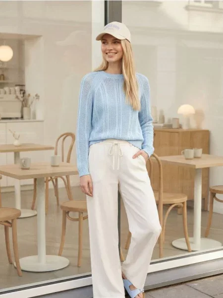 Ажурний светр з бавовною блакитний