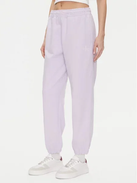 Spodnji del trenirke Calvin Klein Jeans vijolična
