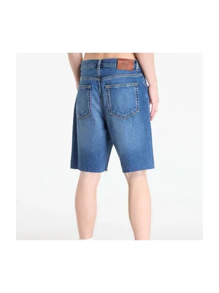 Pantaloni Calvin Klein Jeans albastru