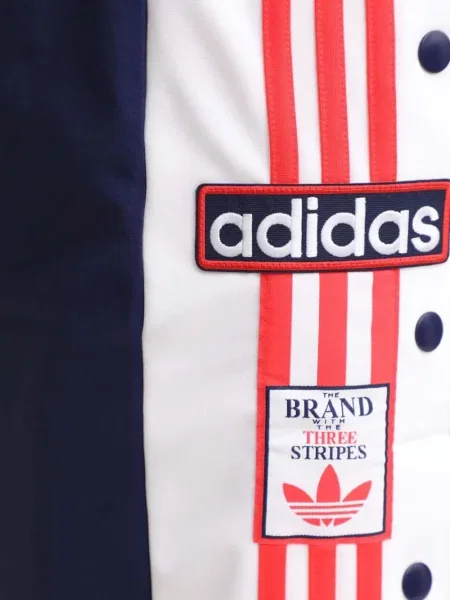 Pruhované áčkové kalhoty Adidas modré