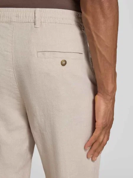 Spodnie materiałowe o kroju regular fit z mieszanki bawełny i lnu Selected Homme beżowe