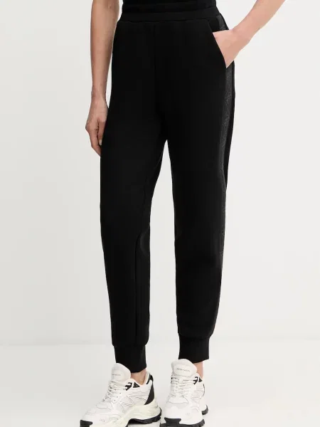 Donji dio trenirke Guess NEW VICTOIRE s aplikacijom crna