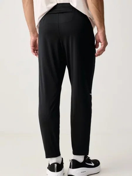 Nike spodnie do biegania Miler Dri-FIT czarne