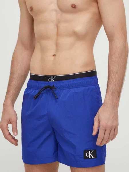 Szorty kąpielowe Calvin Klein Medium Double WB midnight lagoon granatowe