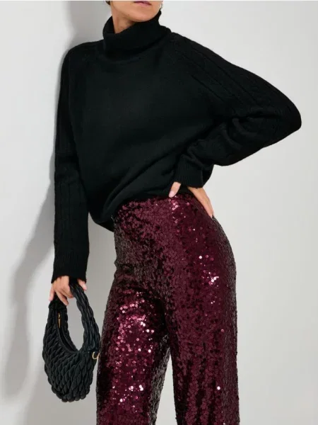 Гольф з оздобленими рукавами чорний