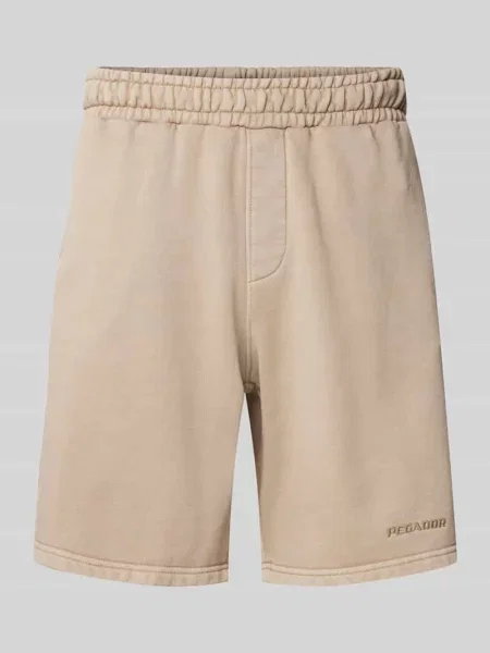 Szorty z dzianiny dresowej o kroju regular fit z detalem z logo Pegador beżowe