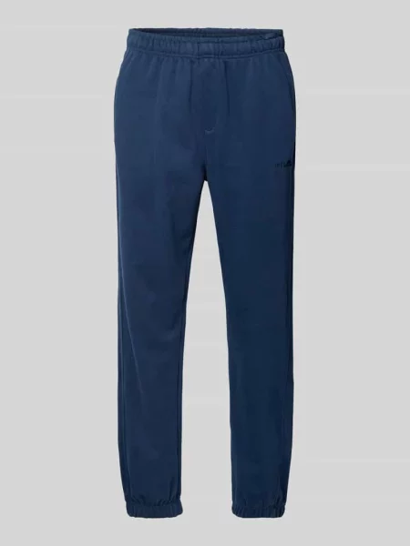 Spodnie dresowe o kroju regular fit z wpuszczanymi model ‘ORVINIO’ Ellesse