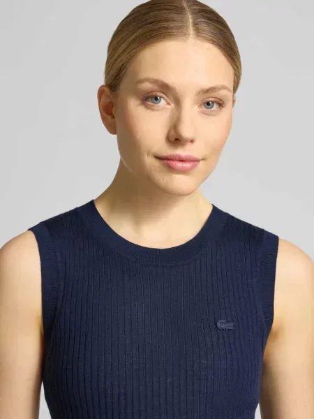 Bezrękawnik o kroju slim fit z czystej wełny Lacoste
