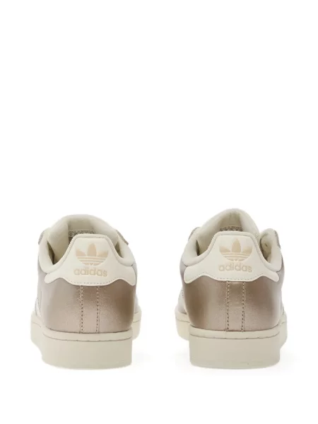 Pantaloni palazzo Adidas cu dungi cu decolteu în V negru