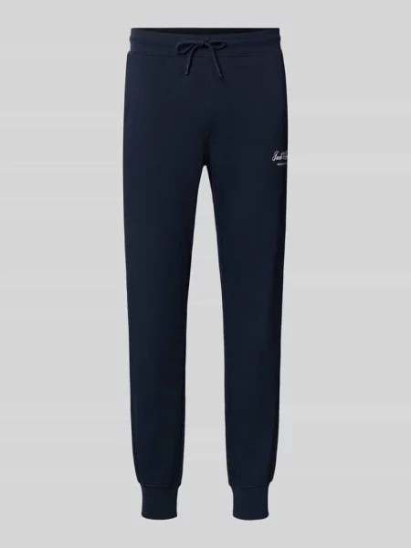 Spodnie dresowe z nadrukiem z logo model GORDON' Jack & Jones granatowe
