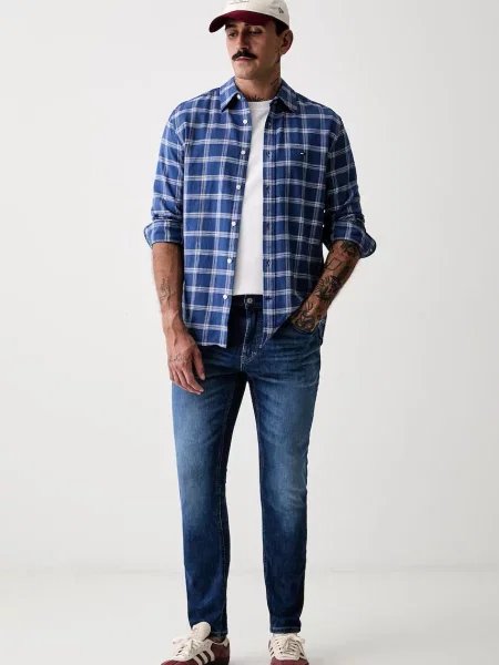 Tommy Jeans traperice slim taper za muškarce plava