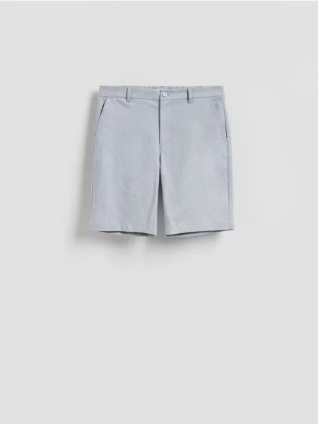 Reserved Pantaloni scurți carrot fit albastru-pal albastru