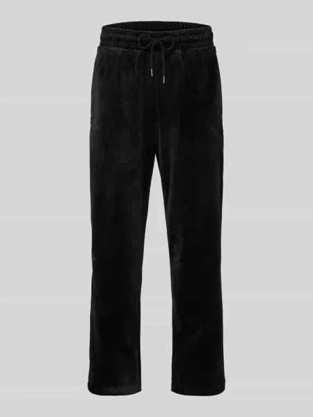 Spodnie dresowe o kroju relaxed fit z detal z logo Puma Performance czarne