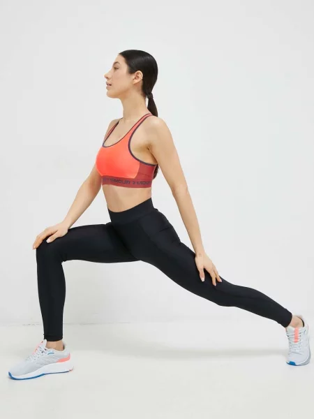 Under Armour sportovní podprsenka UA Crossback oranžová