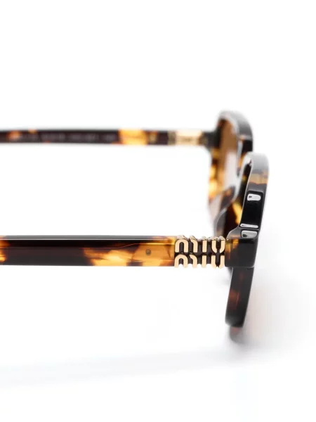 Slnečné okuliare Miu Miu Eyewear hnedá
