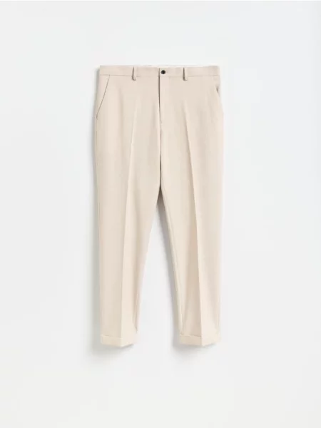 Reserved Pantaloni carrot fit bej