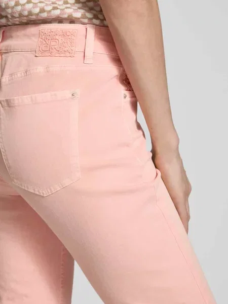 Jeansy krój slim fit z frędzlami Raffaello Rossi różowe