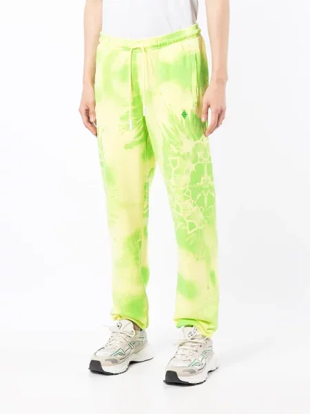 Běžecké kalhoty Marcelo Burlon County Of Milan s vázáním žluté