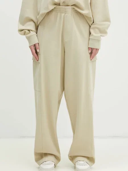 Pangaia spodnie dresowe gładkie beżowy