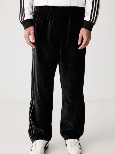 Adidas Originals spodnie dresowe z bawełną Firebird Velour czarne