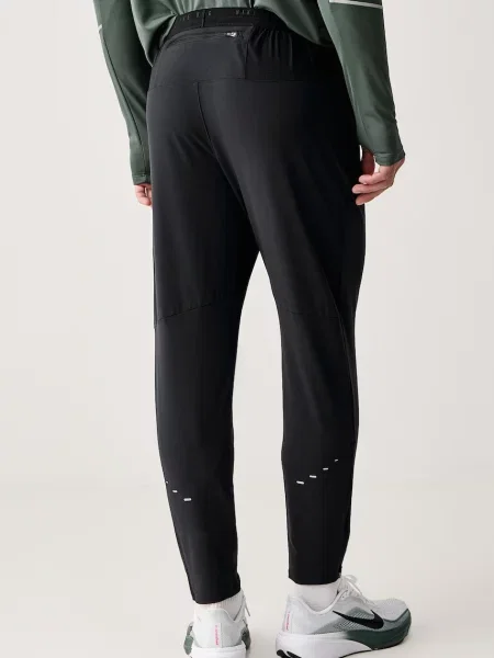 Nike spodnie do biegania Stride Dri-FIT czarne