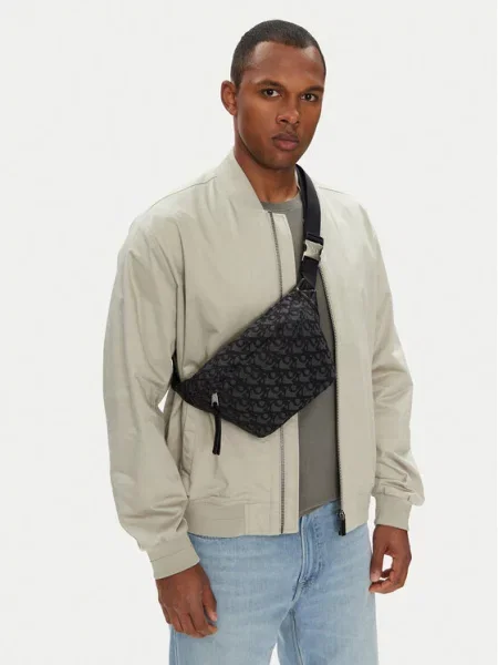 Calvin Klein Jeans Torbica za okrog pasu﻿ Unstructured Monogram Waistbag črna