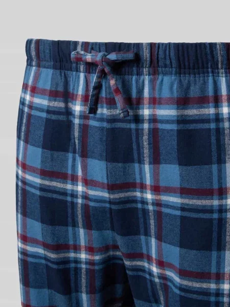 Spodnie od piżamy o kroju regular fit we wzór na całej powierzchni Christian Berg Men granatowe