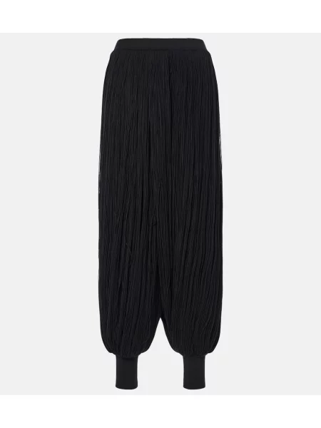 Spodnie Alaïa z frędzli wełniane czarne