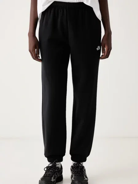 The North Face pantaloni de trening pentru femei cu Evolution negru