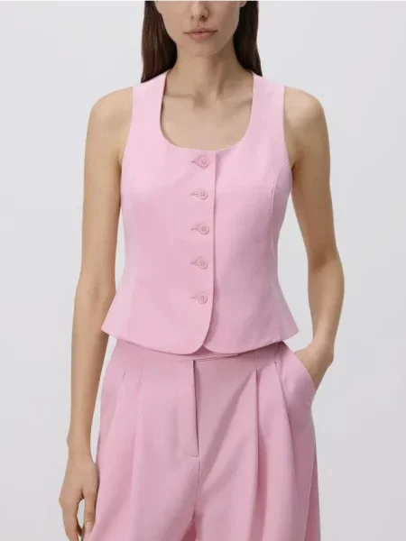 Reserved Vestă cu adaos de roz
