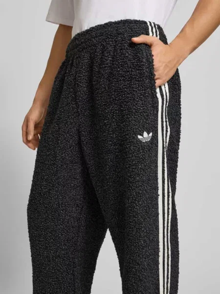 Spodnie dresowe z elastycznym ściągaczem Adidas Originals czarny