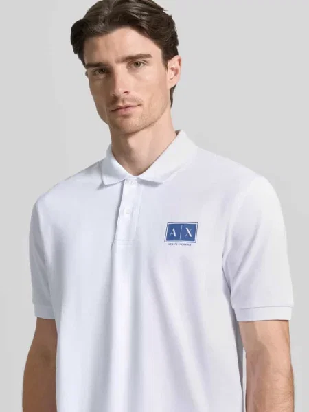 Koszulka polo o kroju regular fit z listwą guzikową Armani Exchange białe