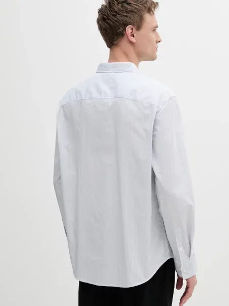 Košile Calvin Klein Jeans relaxed s klasickým límcem modrá