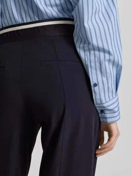 Spodnie o kroju slim fit z elastycznym pasem z logo model EDEN' Cambio