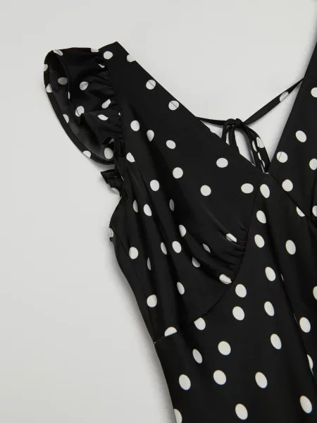 Міді сукня в горох з воланами чорний