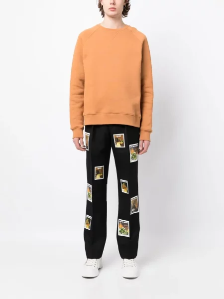 Vilnonės raštuotos kelnės Denim Tears juoda