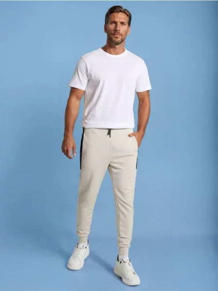 Sinsay Spodnie dresowe beżowy