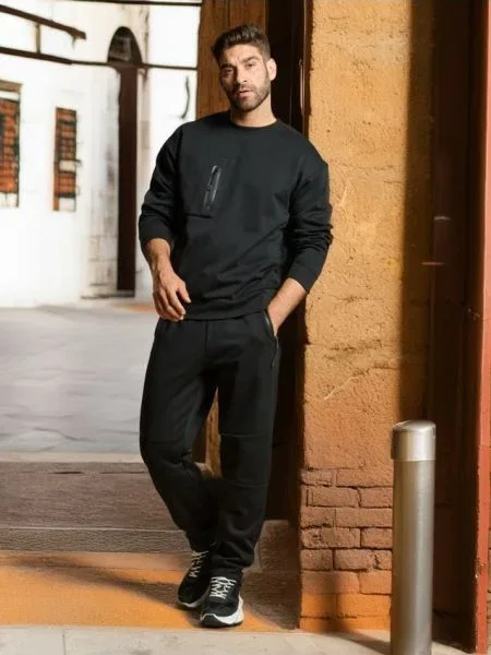 Sinsay Teplákové kalhoty se širokými nohavicemi černá