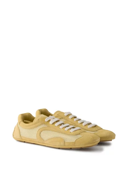 Sneakerși Prada din piele de căprioară galben