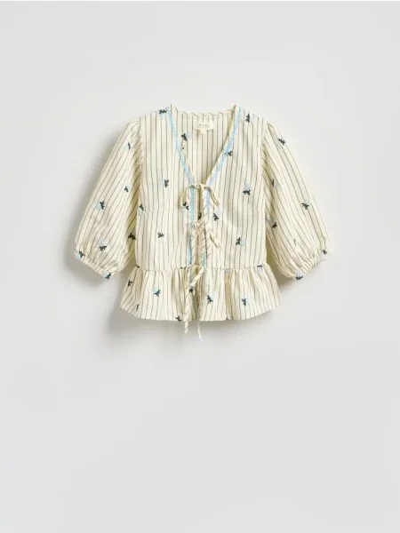 Reserved Bluză cu motiv floral crem