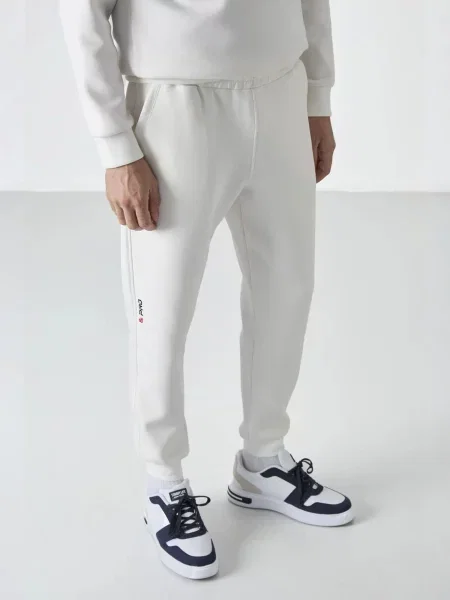 Tommy Life Športne hlače Jogginghose off-bela bela