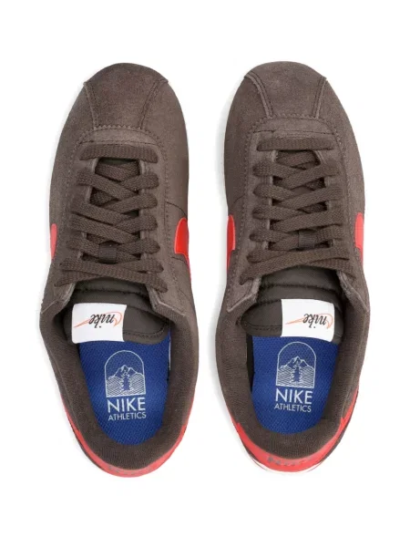 Iš natūralios odos retro stiliaus kelnės Nike apvaliu kaklu ruda
