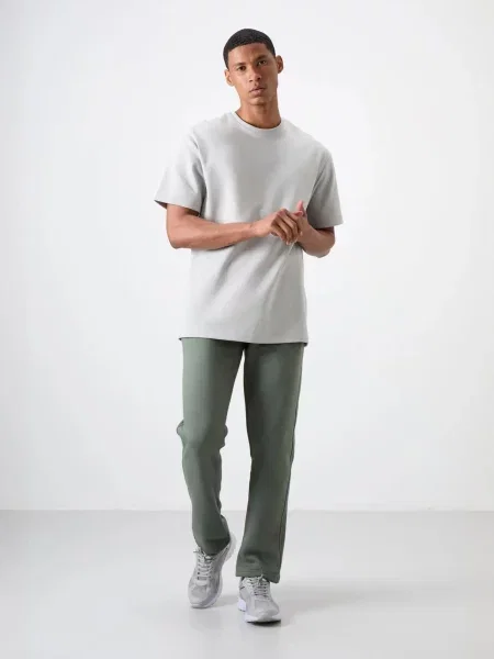 Tommy Life Športne hlače Jogginghose pastelno zelena